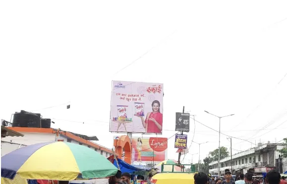 Nahata Sky hoarding above a market road